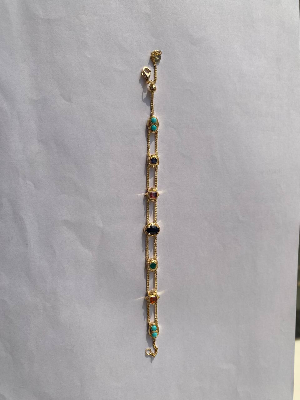 Metal bracelet original product photo — outdoor natural lighting on marble surface for Phot.ai jewelry background removal test